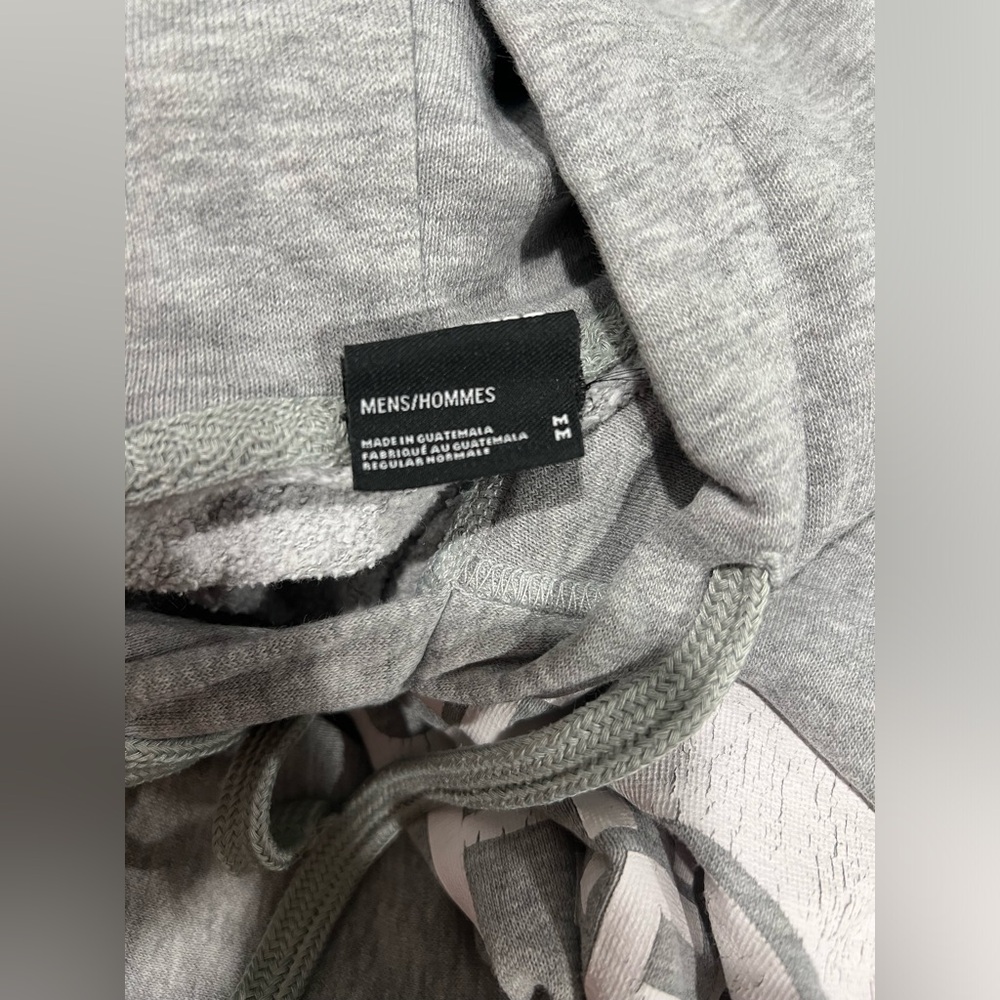 Medium grey north face hoodie.